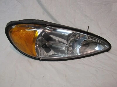 Pontiac Grand AM 2002 faro lado del pasajero Foto 1 de 3