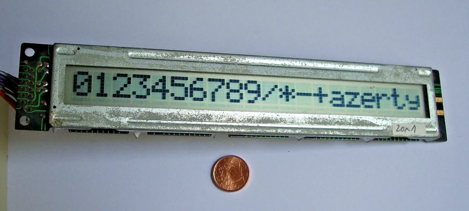 Afficheur alphanumérique LCD Hitachi LM038 avec 20 grands caractères  9,4mm - Photo 1/1