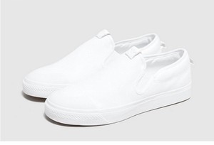 adidas white slip on trainers