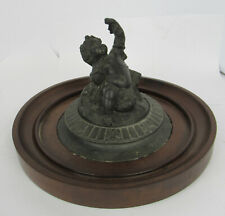 Unusual Spelter Figure Of A Reclining Cherub Draped In Flowers And Leaves
