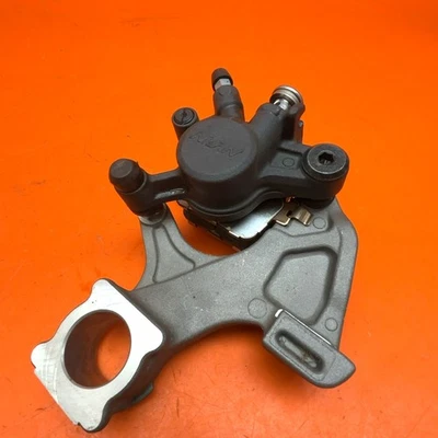 2009-2015 SUZUKI GSXR 1000 OEM REAR BACK BRAKE CALIPER W MOUNT BRACKET - Image 1 of 4