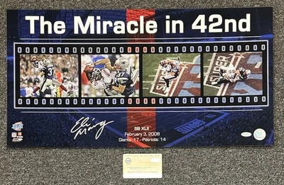Eli Manning NY Giants SIGNED 12x23” Color Super Bowl XLII Photo w/ STEINER COA - Image 1 of 4