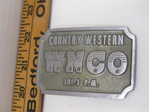 OLD COUNTRY WESTERN WNCO 101.3 F.M.RADIO STATION BELT BUCKLE CLOTHING - Picture 1 of 1