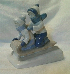 Porcelana de Cuernavaca Ceramic Sled Riding Children Figure 1992 - Picture 1 of 6