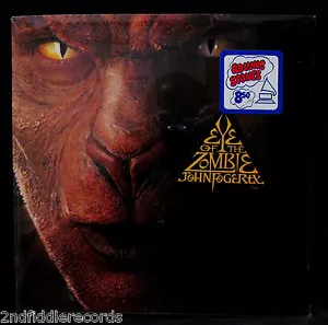 JOHN FOGERTY-Fully Sealed EYE OF THE ZOMBIE Album-WARNER BROTHERS-CCR - Imagen 1 de 2