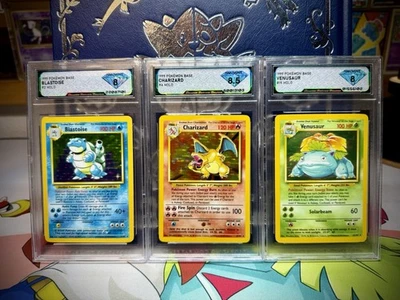1999 Pokémon Base CHARIZARD #4 Holo DSG 8.5 BLASTOISE #2 VENUSAUR #15 BIG THREE - Image 1 of 4