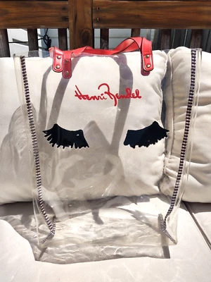 Bolso de Mano Henri Bendel "Pestañas para Ojos" PVC Transparente con Asas Rojas y Borde a Rayas Foto 1 de 4