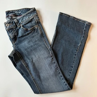 Pantalones de mezclilla vintage Y2K Tommy Hilfiger tiro bajo corte bota para mujer talla 2R elásticos acampanados Foto 1 de 4