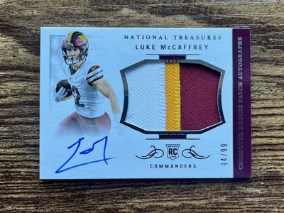 LUKE MCCAFFREY 2024 NATIONAL TREASURES CROSSOVER ROOKIE PATCH AUTO /99 - Image 1 of 2