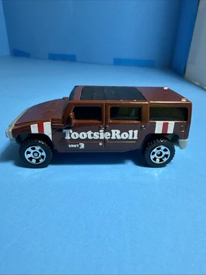 Matchbox Hummer H2 SUV Concept 1:72 Diecast Tootsie Roll Brown Candy 2015 (T16) - Image 1 of 4