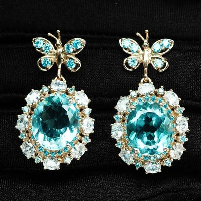 Pendientes de oro rosa de plata de ley 925 ovalados aguamarina azul marino prístino de 11,20 quilates Foto 1 de 4