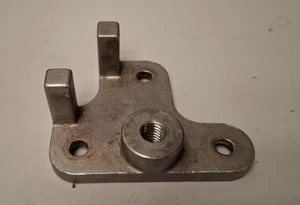 UNIMAC  Washer CASTING BRAKET TOP LATCH SS UW. P/N: F150201P,  150201  [USED] - Picture 1 of 3