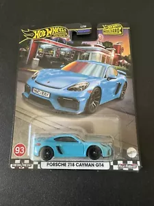 2024 Boulevard, Porsche Cayman Diecast 1:64, Real Riders Tires, Blue - Picture 1 of 3