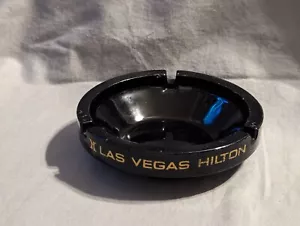 Posacenere in vetro vintage "Las Vegas Hilton" Hotel & Casino, nero, 4 3/8" USATO - Foto 1 di 10