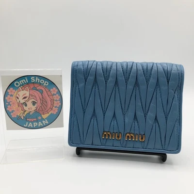 Cartera plegable de cuero azul Miu Miu Matelasse cartera compacta con... - Imagen 1 de 4