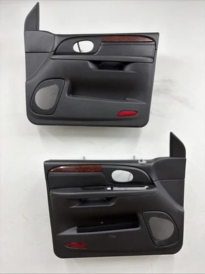 02-09 GMC Envoy передние дверные панели питание от оригинального производителя черное/черное/зернистое дерево читать - Изображение 1 из 4