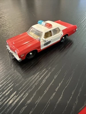 1:64 Johnny Lightning  THE DUKES OF HAZZARD Finchburg Police 1977 Dodge Monaco - Image 1 of 4