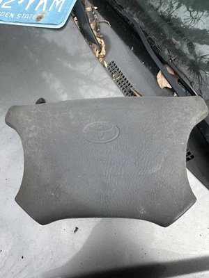 1991 Toyota Previa steering wheel horn pad - Image 1 of 3