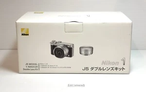 Nikon 1 J5 Silver Double W Lens Kit 10-30mm 18.5mm Mirrorless Camera - Brand New - Picture 1 of 11