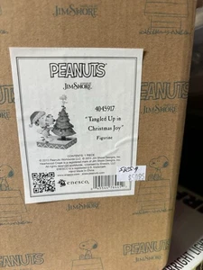 Snoopy & Woodstock Tangled Up In Christmas Joy -Jim Shore Figurine - Picture 1 of 3