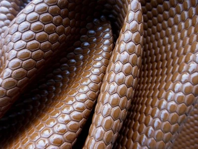 Goatskin leather hide Whiskey Colored Embossed Tiny Hexagons semi gloss finish - Image 1 of 4