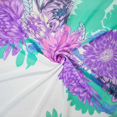 Tela tejida de gasa estampada floral poli turquesa-rosa-multi Foto 1 de 3