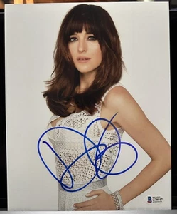 FOTO FIRMADA POR DAKOTA JOHNSON CINCUENTA SOMBRAS DE GRIS 8X10 ESCOTE AUTÓGRAFO CERTIFICADO DE AUTENTICIDAD 1 - Imagen 1 de 3
