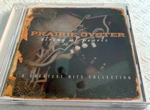 PRAIRIE OYSTER-STRING OF PEARLS:GREATEST HITS COLLECTION-CD-(Country) - Imagen 1 de 2