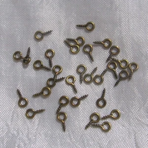 100 TIGES CLOUS BOUCLE 8x4 METAL COULEUR BRONZE POUR FIMO PENDENTIFS RESINE*J92 - Picture 1 of 2