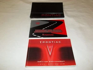 1999 PONTIAC GRAND AM OWNER'S MANUAL 3/PC.SET & BLACK PONTIAC FACTORY CASE // - Picture 1 of 3