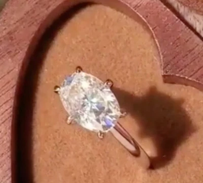 Anillo solitario para mujer de corte ovalado de 1,00 quilates de diamantes cultivados en laboratorio de oro rosa de 14 k certificado Foto 1 de 4