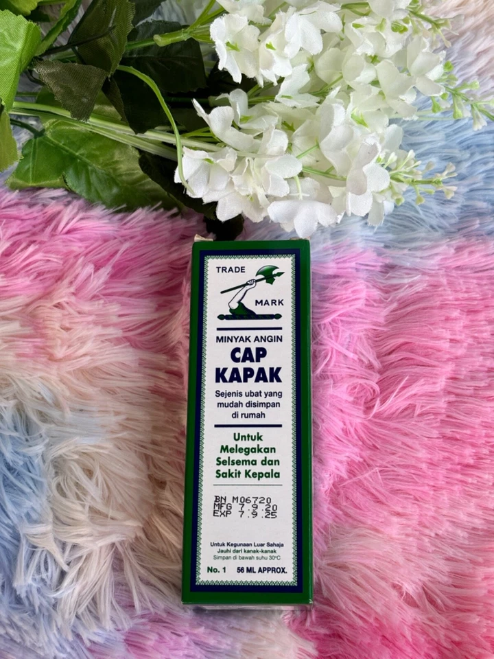 Aceite medicinal marca Minyak Cap Kapak Axe 56MLx2 Foto 1 de 3