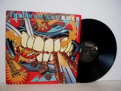 LET THEM EAT ROCK 1986 RCA JUDAS PRIEST, SCORPIONS, GRIM REAPER, AUTOGRAPH, MASS - Image 1 of 3