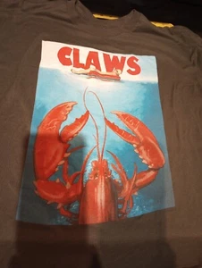 Rare Retired Liquid Blue JAWS Movie Parody CLAWS Lobster Attacking Dude in Tube - Picture 1 of 6