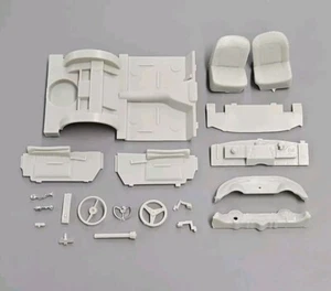 AMT 1/25 1955 CHEVY CORVETTE 2-N-1 INTERIOR AND RELATED PARTS MOLDED IN GREY - Picture 1 of 1