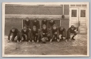 Postcard College ? Football Players Team Uniforms Leather Helmets RPPC c1920s - Picture 1 of 2