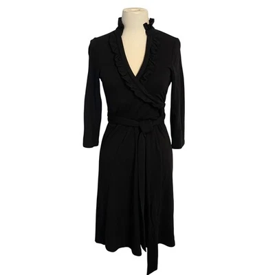 Vestido Banana Republic Negro Mezcla de Lana Envolvente Volantes Escote Corbata Cintura Talla Pequeña Foto 1 de 4