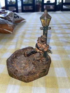 Vintage Collectible 1930's Cast Iron FIGURAL MAN Resting on Lamp Post AshTray - Picture 1 of 5