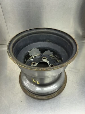 Llanta trasera 94 95 96 97 98 99 Polaris Xpress Xplorer 250 400 300 OEM 10x8,5 Foto 1 de 4