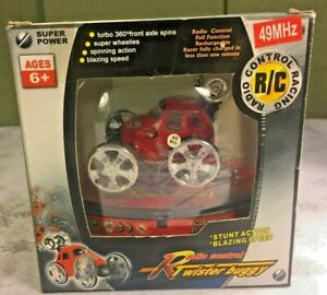 Radio Control Mini Red Stunt Racer Twister Buggy Car Wheelies Action