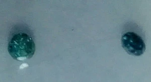 2 Diamantes azul mejorado 1.5 Mm. 0.03 Ct. - Imagen 1 de 11