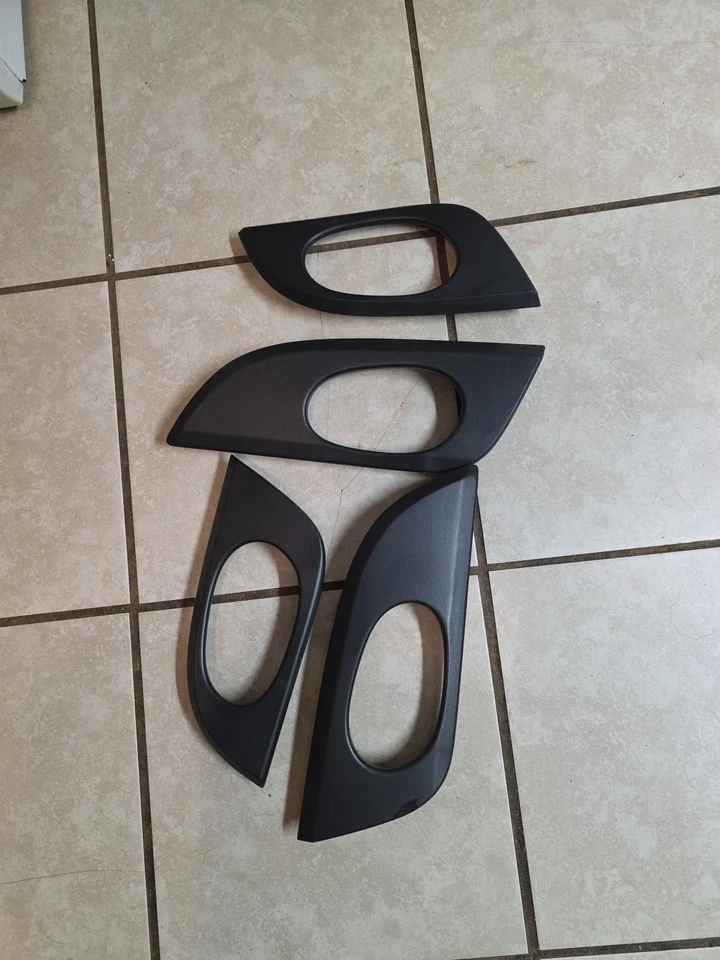 02-09 GMC Envoy 02-06 Envoy XL Juego de bisel de cubierta de manija de puerta interior Foto 1 de 4