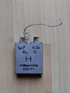 Kondensator, Hersteller unbekannt, 1 mF, 650 Volt, Telefon alt, antik. - Afbeelding 1 van 4