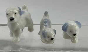 Estatuillas de porcelana en miniatura vintage de perros hechas en Japón de 1,5" x3 - Imagen 1 de 3