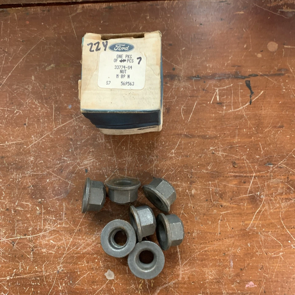 BOX OF 7 NOS 1980 - 1989 FORD E150 E250 E350 REAR SPRING NUTS — 第 1/1 张图片