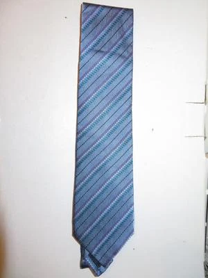 NUEVA CORBATA A RAYAS PARA HOMBRE HUNTING WORLD 100% SEDA AZUL, MORADO, BLANCO Y NEGRO Foto 1 de 3