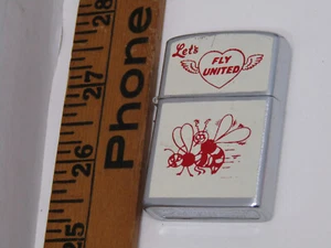 OLD PENGUINO 111957 JAPAN LETS FLY UNITED BEES CIGARETTE LIGHTER COLLECTIABLE - Picture 1 of 1