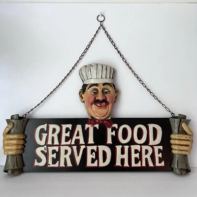 Letrero colgante de restaurante "Gran comida servida aquí" cara de chef italiano francés Foto 1 de 4