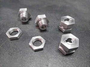 BUJES DE RUEDA HEXAGONALES THUNDER TIGER MTA4-TEAM ASOCIADO MGT 17 MM - Imagen 1 de 6