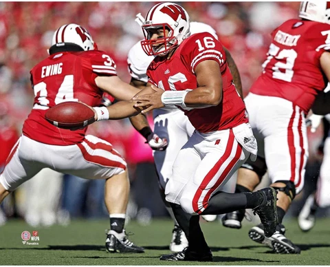 Russell Wilson Wisconsin Badgers Unsigned Red Jersey Hand Off Photograph Cover